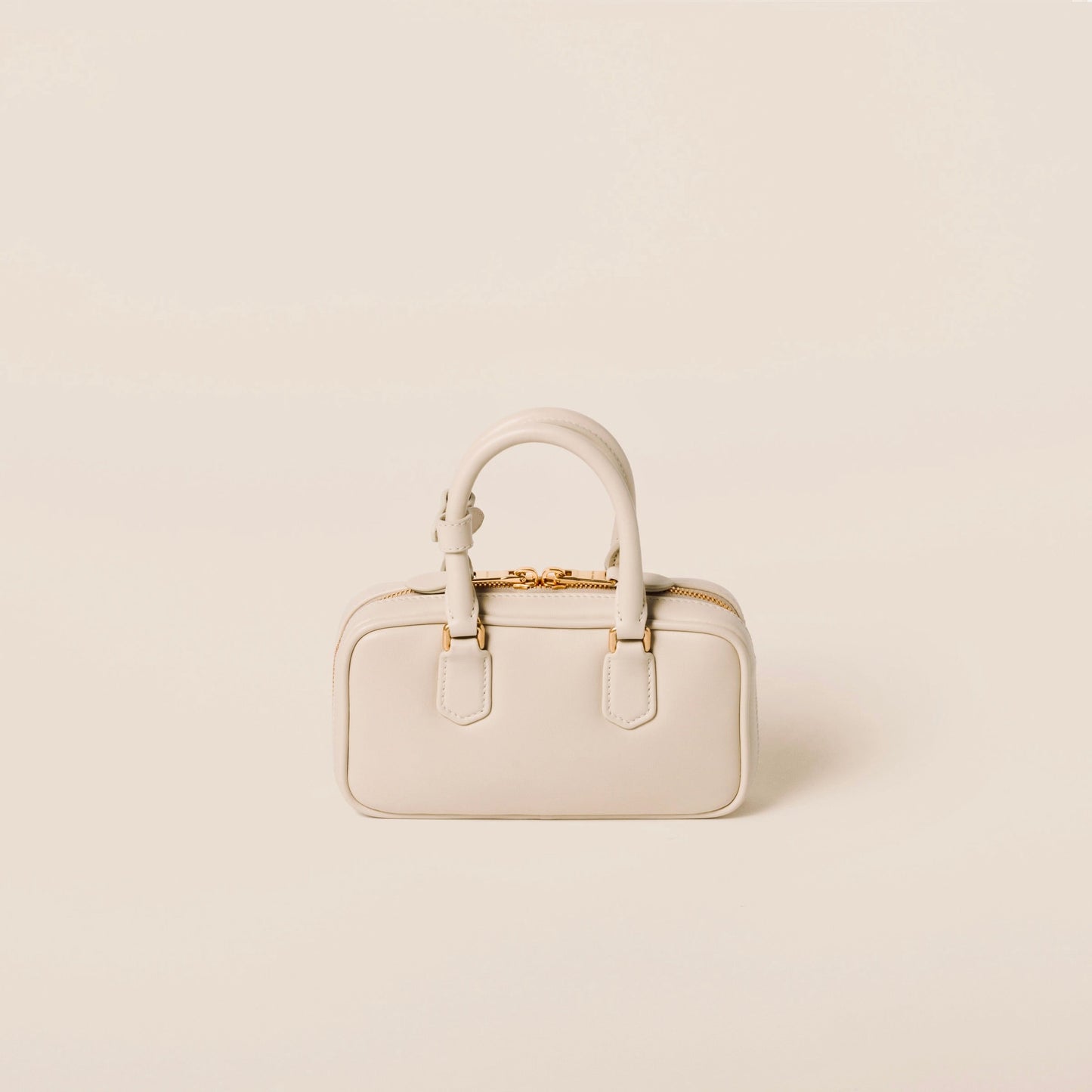 Mini-sac en semi cuir Arcadie en beige
