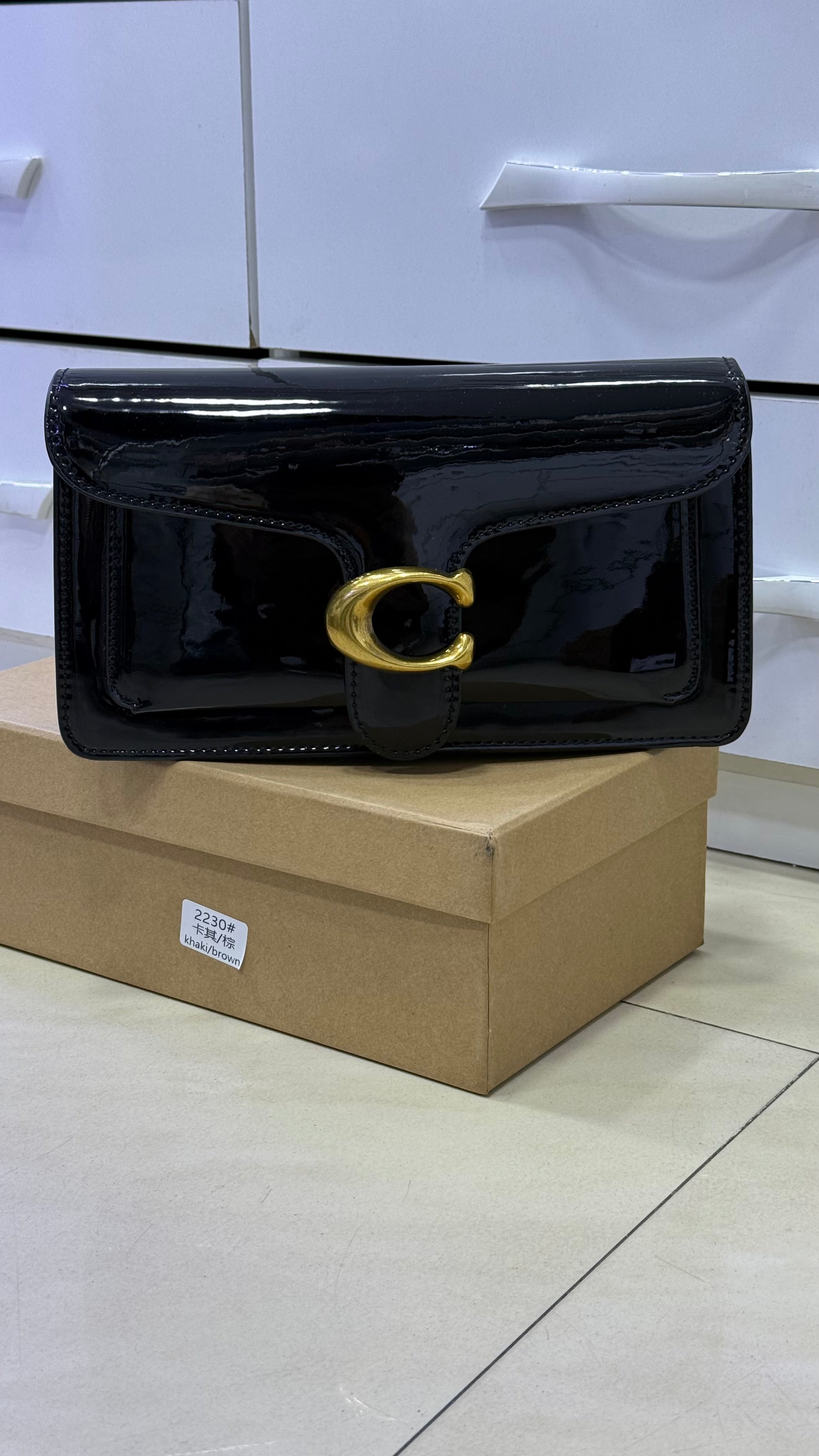 Sac Pochette Coach à chaîne Tabby