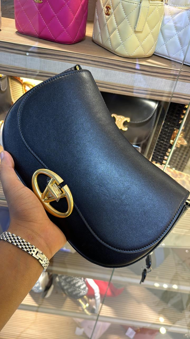 Sac Valentino Garavani besace Ohval en cuir