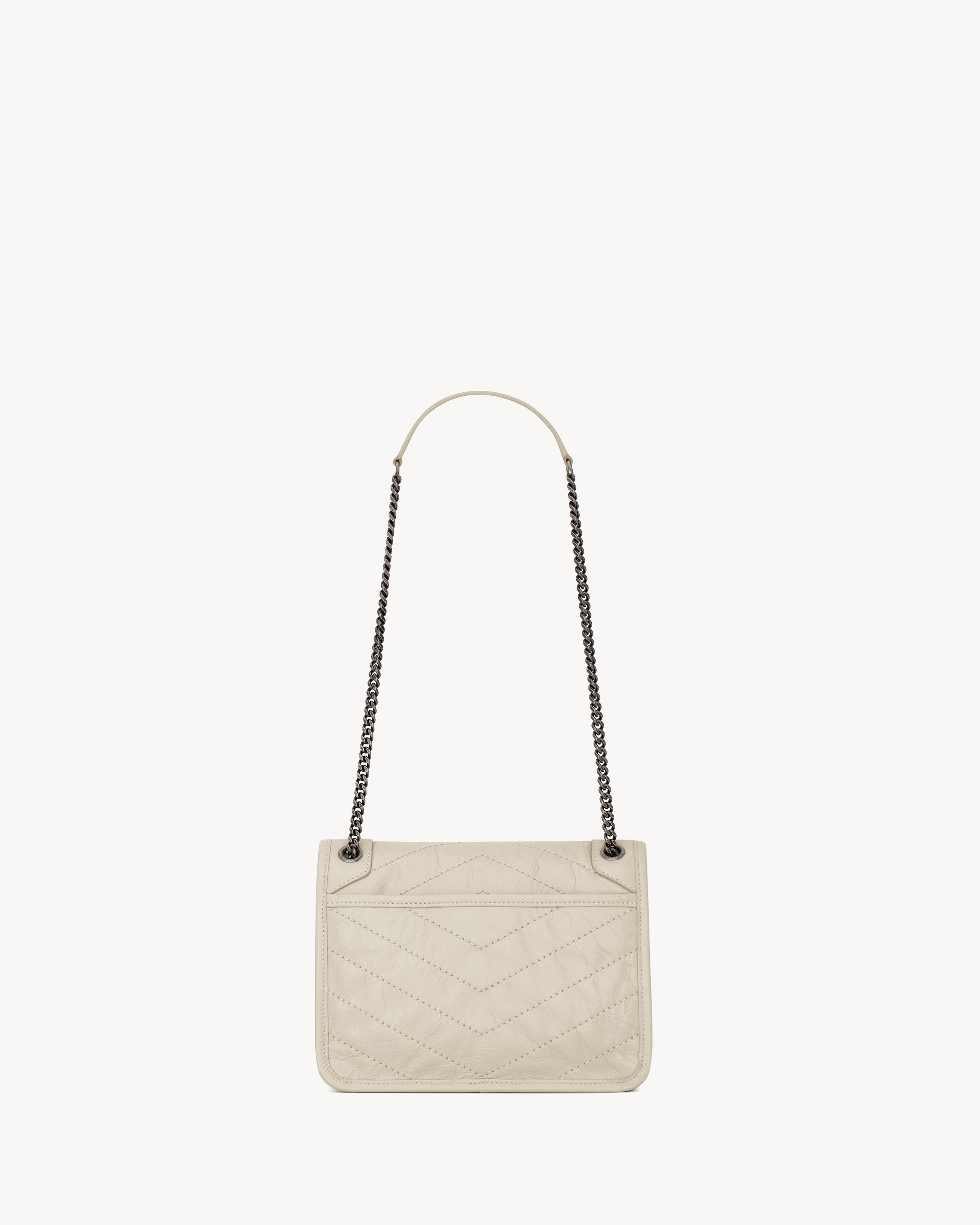 SAC YSL NIKI BABY EN SEMI CUIR 
BLANC VINTAGE