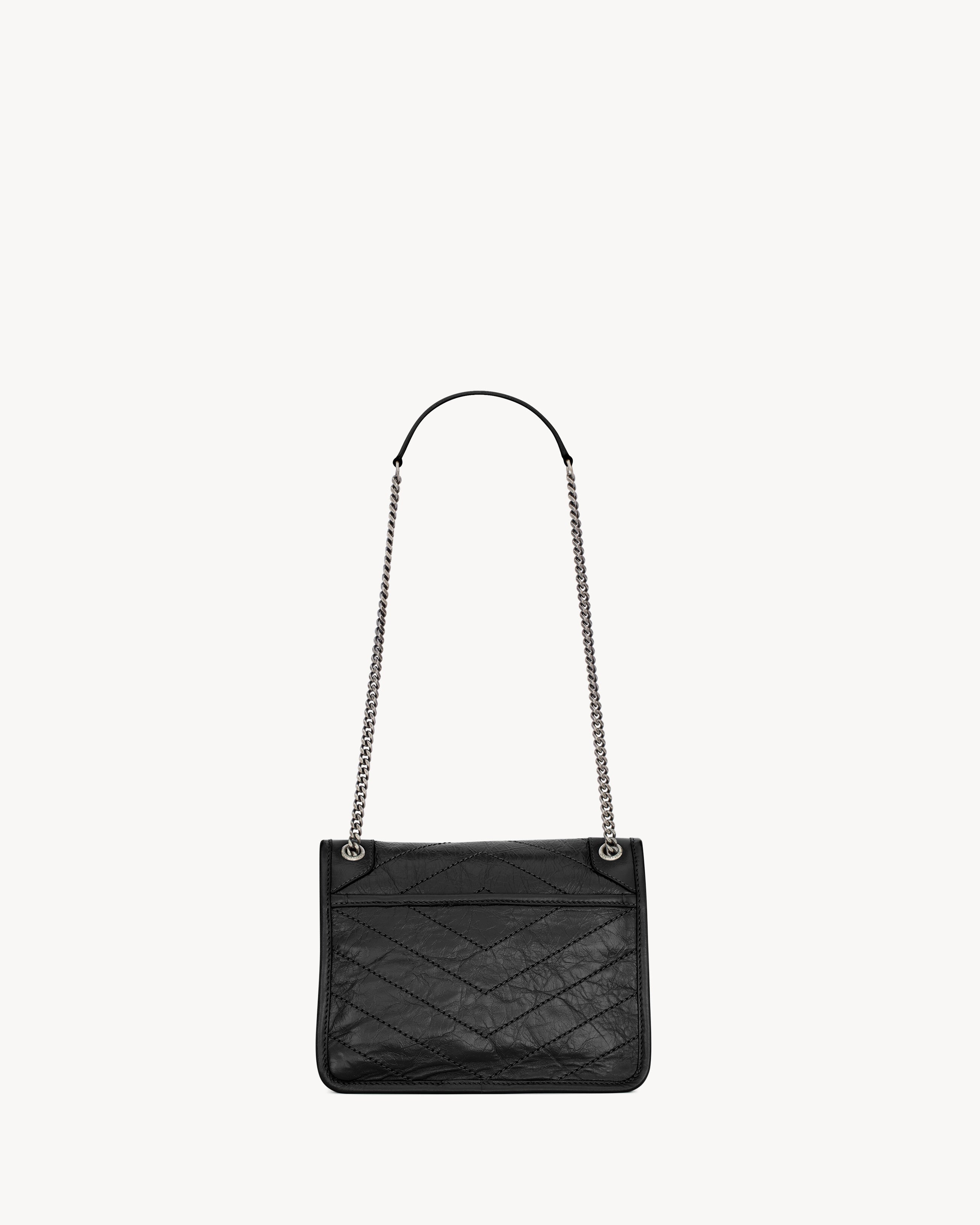 SAC YSL NIKI BABY EN SEMI CUIR VINTAGE NOIR